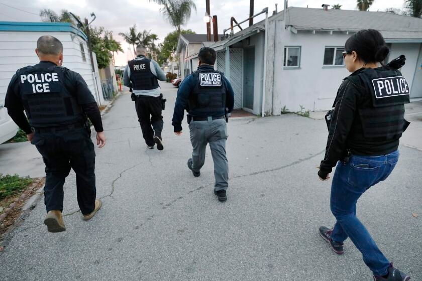 Agents, some in unmarked cars and street clothes, are arresting L.A. immigrants. Who are they?
