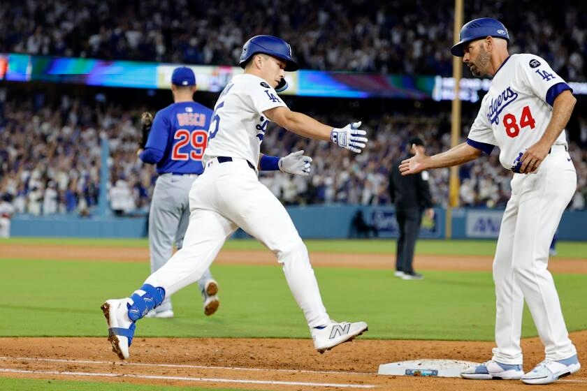 Dodgers coach Chris Woodward is 'proud' of Rangers managerial stint, despite 2022 firing