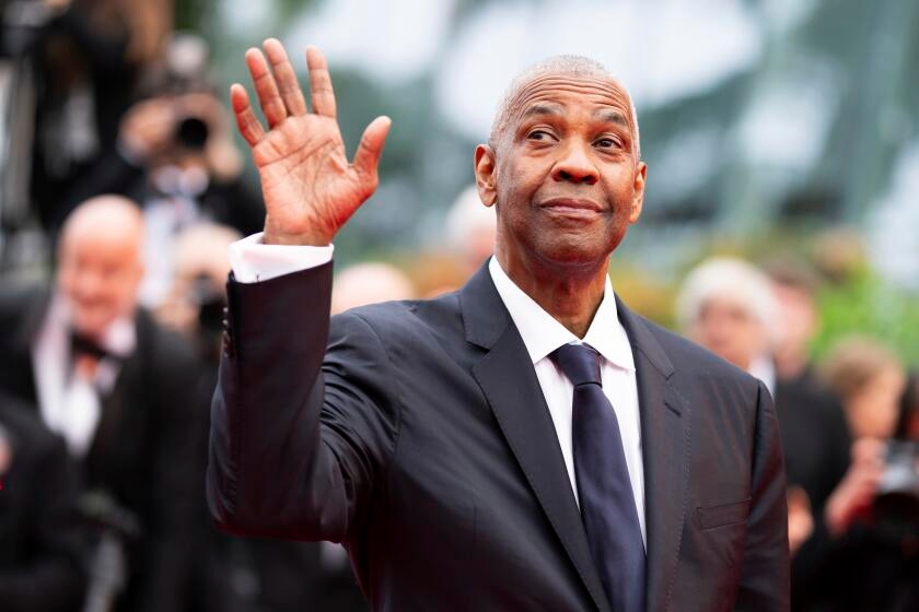 Denzel Washington's Cannes surprises: honorary Palme d'Or plus one handsy shutterbug