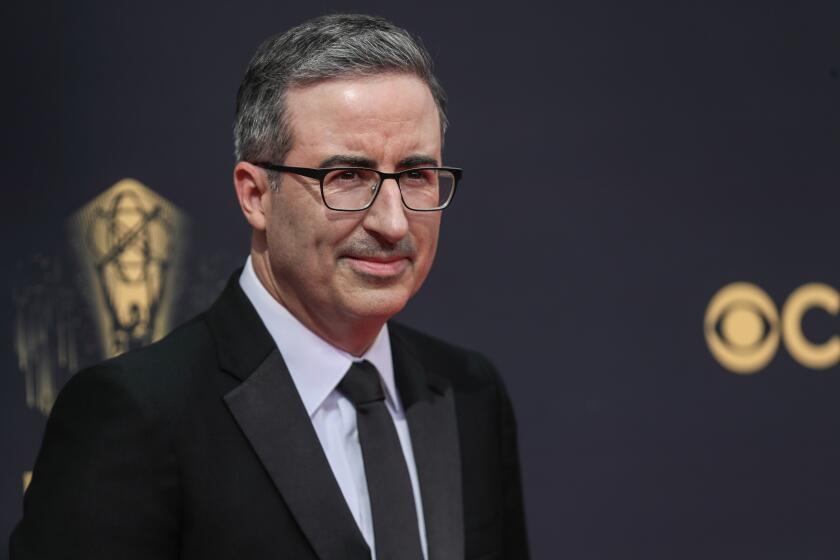 John Oliver sued by healthcare boss he rebuked on air over 'bowel movement' comments