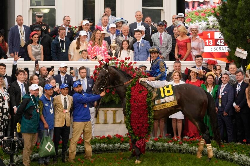 Sovereignty surges past race favorite Journalism to win the 151st Kentucky Derby