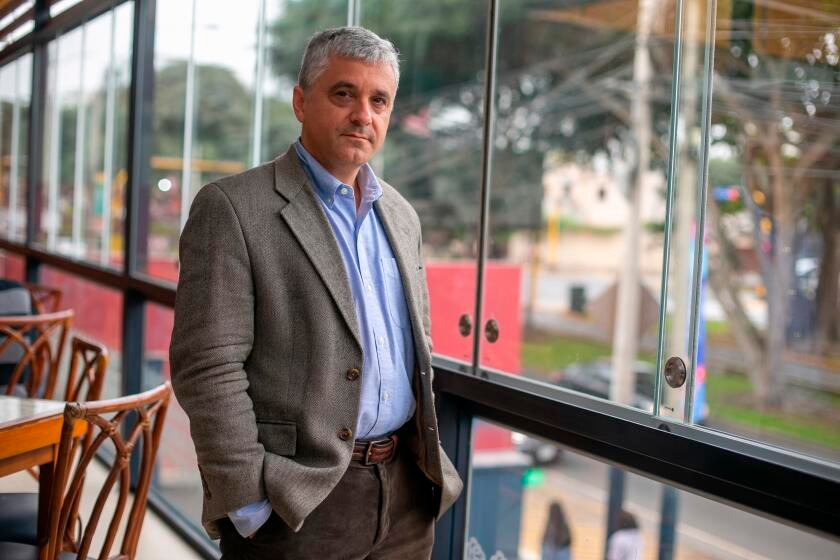 This professor studies dictatorships. He helped convince Harvard to stand up to Trump