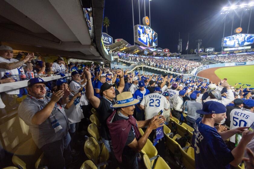 Hernández: Cowardly Dodgers remain silent as ICE raids terrorize their fans