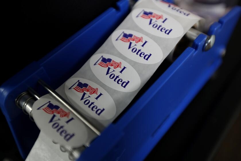 California tries again to overturn Huntington Beach's controversial voter ID law