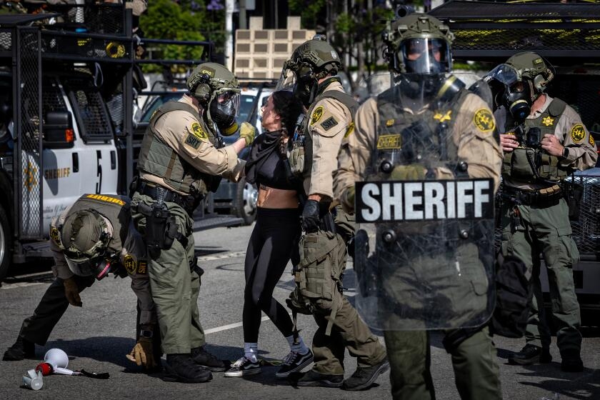 Proposed bill would ban ICE agents, law enforcement from wearing masks in California
