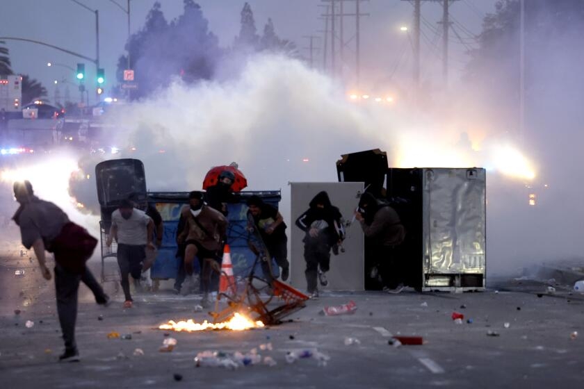 Federal prosecutors 'coming after' L.A. protesters, but do some charges encroach on 1st Amendment?