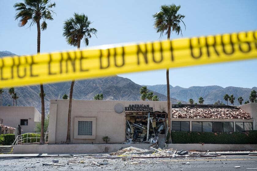As Palm Springs reels in wake of clinic bombing, authorities name suspect and say city is safe