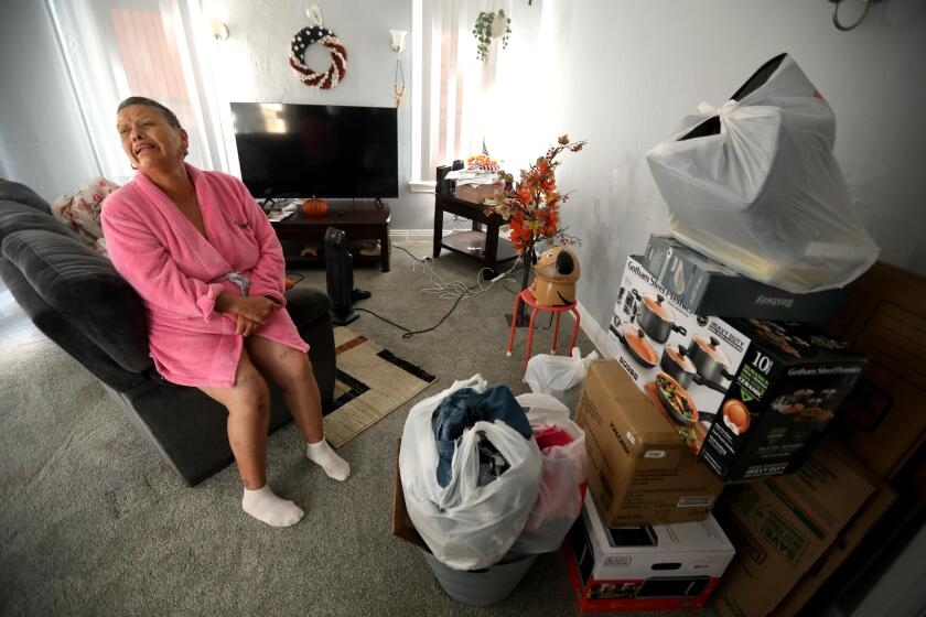 A homeless woman struggles to say goodbye to the home she raised her kids in