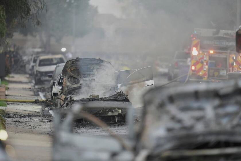 Plane crashes into multiple homes in San Diego, sparking fires, 'giant debris field'