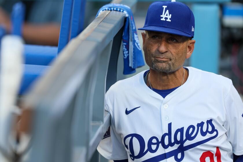 Dodgers coach Dino Ebel's eldest son learned lessons from the pros
