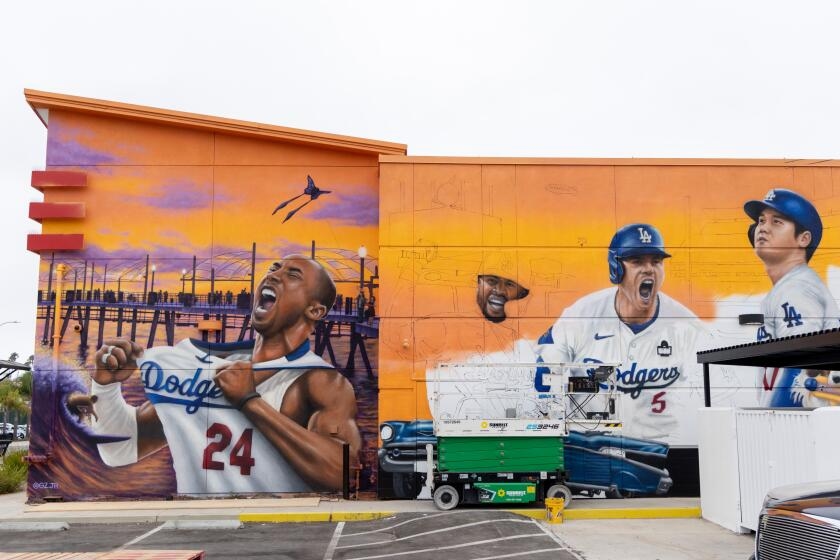 'We wanted to throw a twist on it': Why an iconic Kobe Bryant image was altered for a Dodger-themed mural