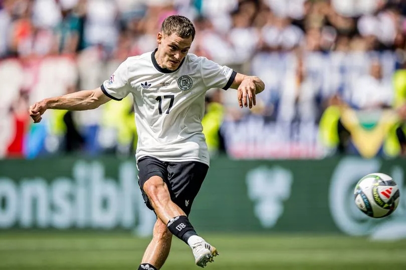 Liverpool announces five-year deal as wait for Florian Wirtz continues