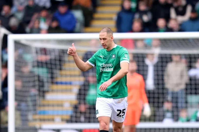 Plymouth player loses TOOTH after gruesome collision during Liverpool tie in FA Cup