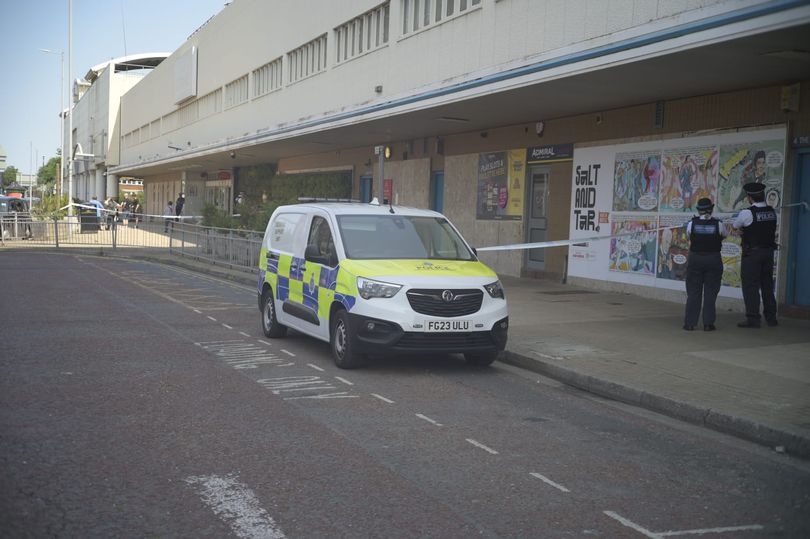 Man in high vis jacket hunted after Post Office robbery