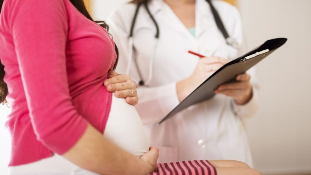RFK Jr. says healthy pregnant women don't need COVID boosters. What the science says.