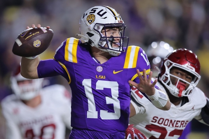 Louisiana governor signs order to allow schools to pay college athletes