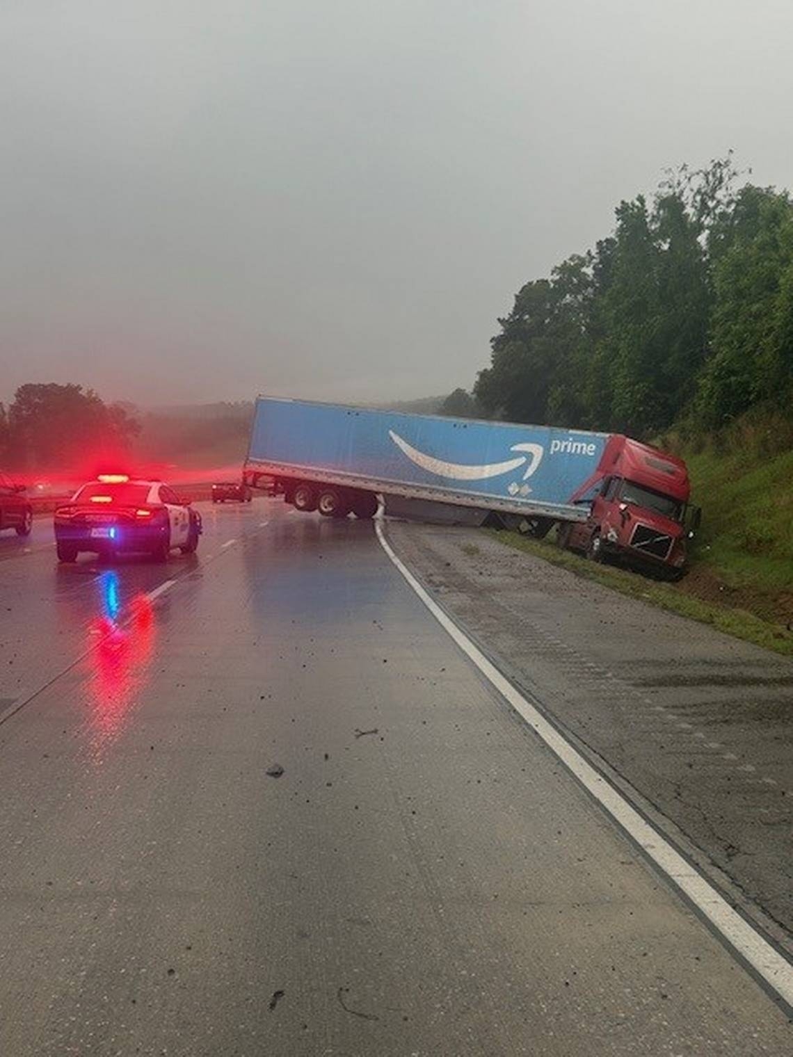 Truck jackknifes on I-75. Monroe County officials urge caution on wet roads
