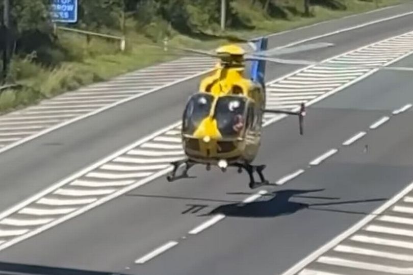 Air ambulance lands on M60 after serious collision between motorbike and car