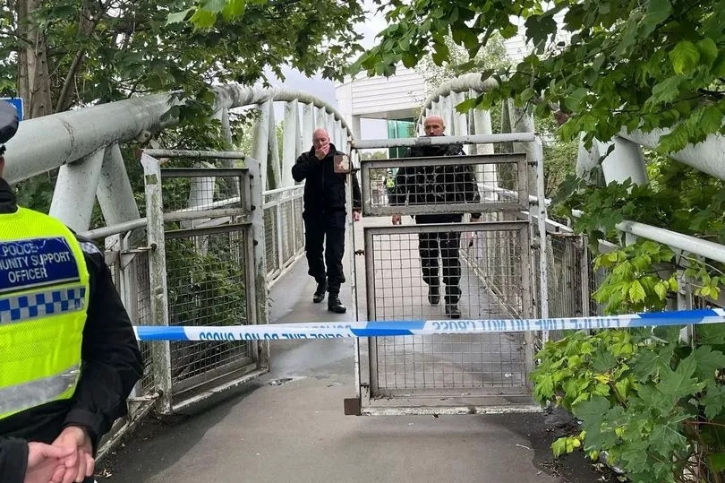 Murder probe as woman found dead after Asda 'armed robbery'