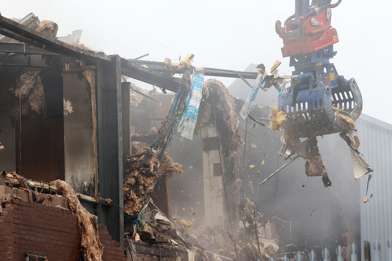 Demolition begins at storage unit site following devastating fire