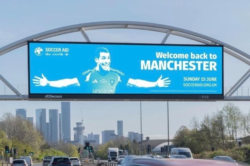 Iconic Carlos Tevez billboard recreated next to Manchester United's Old Trafford