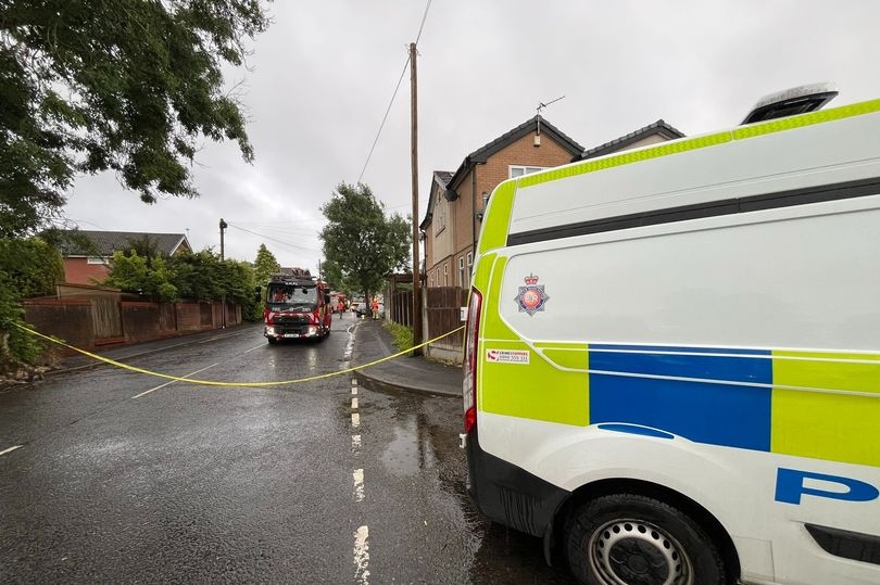 "We heard a huge bang": Roof obliterated as fire ravages house with five rushed to hospital