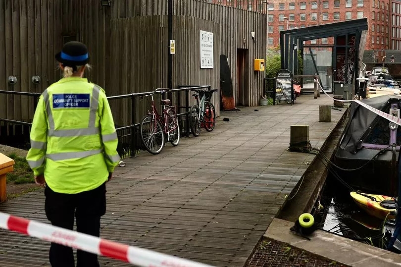 Cordon in place after fire crews spend hours at Manchester marina