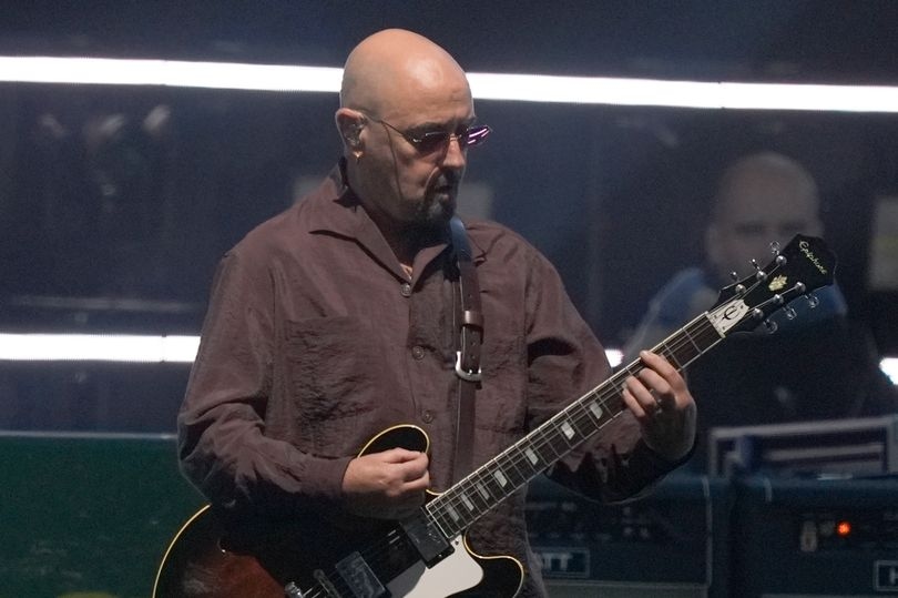 Bonehead takes centre stage with Oasis for first time in 25 years at huge Cardiff gig