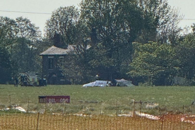 Police issue update on Salford plane crash as man fights for life