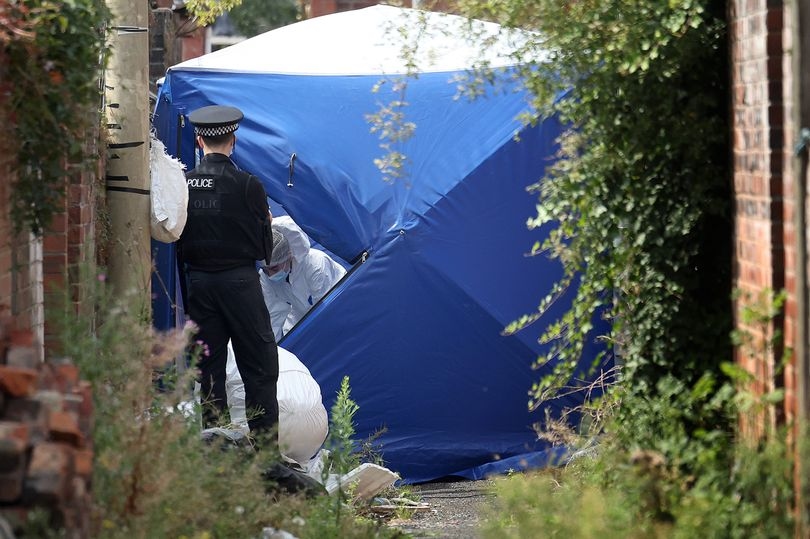 Police probe 'unexplained' death after body found in Moss Side alleyway