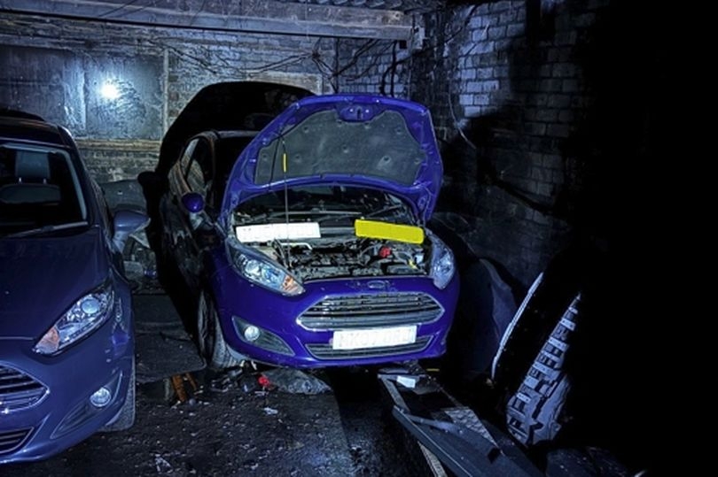 Police make seven arrests after stolen cars found in suspected garage chop shop