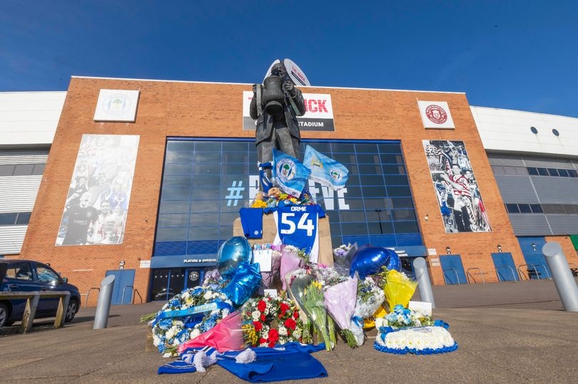 Wigan Athletic fans pay tribute to one of their own at the ground where he was loved