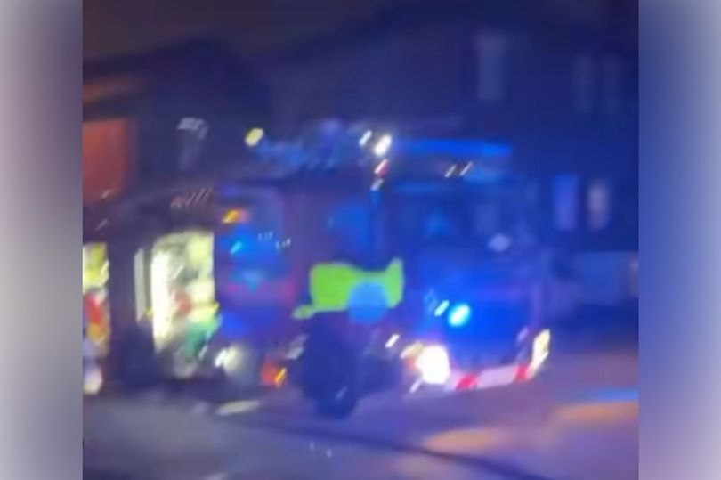 Woman and children escape house fire as emergency services descend on street