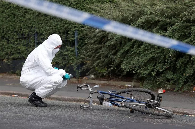 Masked cyclist 'pulled gun from his socks and threatened cop'