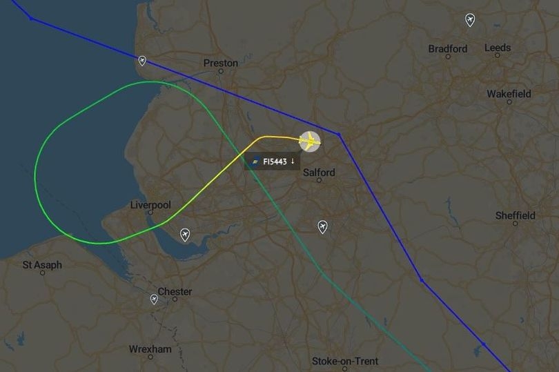 Jet met by fire engines after making emergency landing at Manchester Airport
