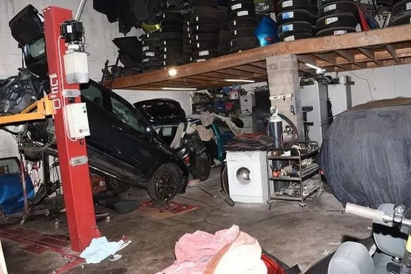 Garage worker crushed by falling car while taking his break