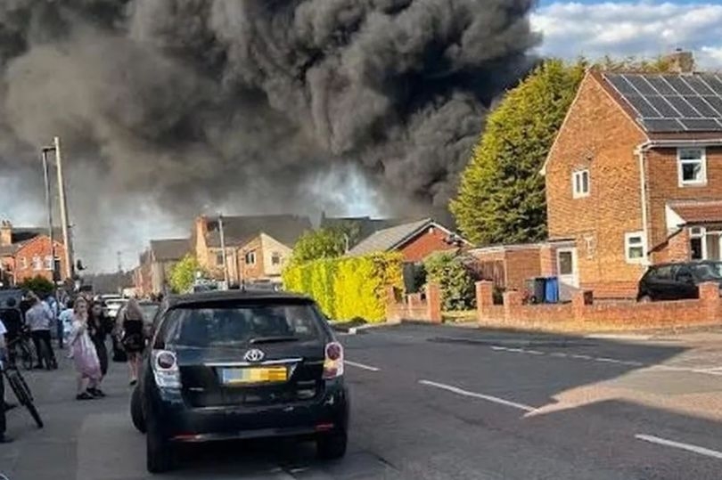 People urged to stay away as firefighters tackle huge blaze