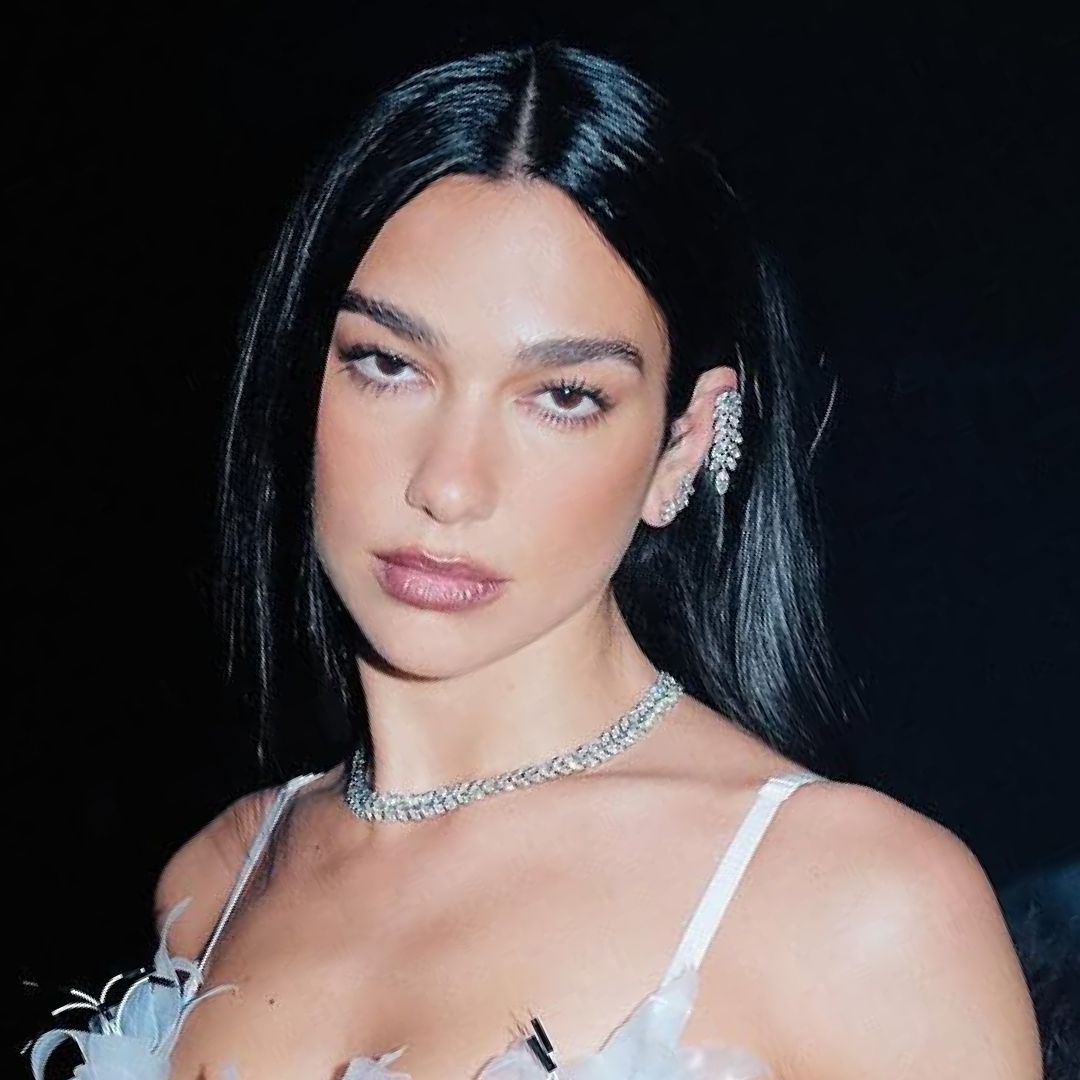 Dua Lipa Channels the Formula 1 Look in a Gucci Racing Jacket