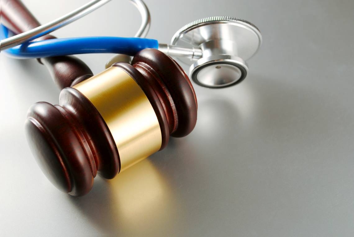 The license status of a Broward doctor facing child pornography charges