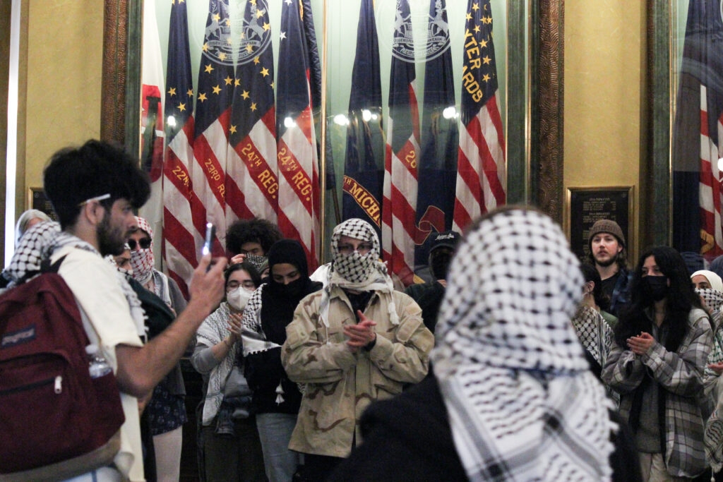Pro-Palestinian university student groups march in and outside of the Michigan Capitol