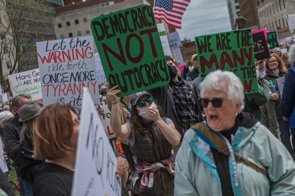 Hundreds march at the Michigan Capitol against Trump policies, part of nationwide protests