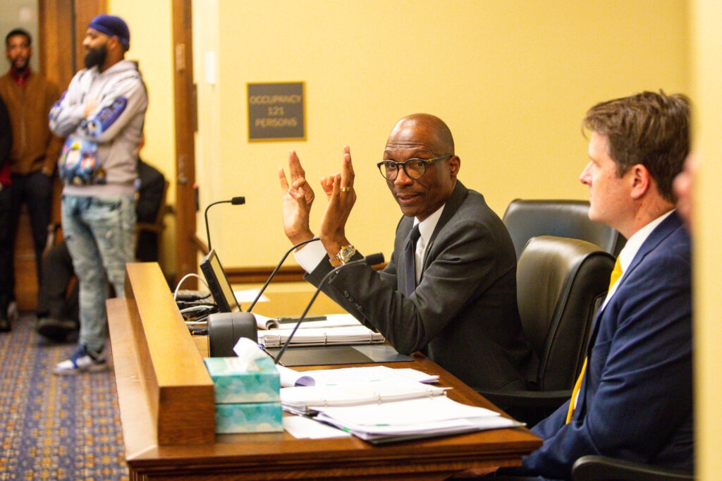 Champion denies conflict of interest, wrongdoing in first ethics hearing on funding for legal client