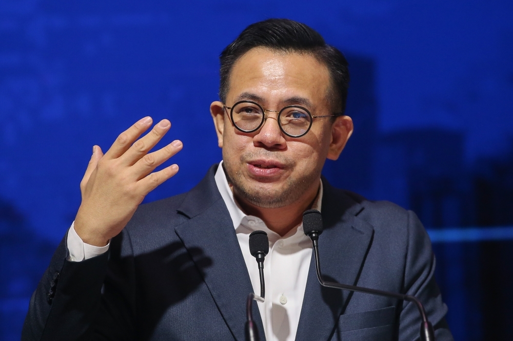 Steven Sim says ready to be sued over ‘racist' claim against PAS leader after attack on Chinese army officer