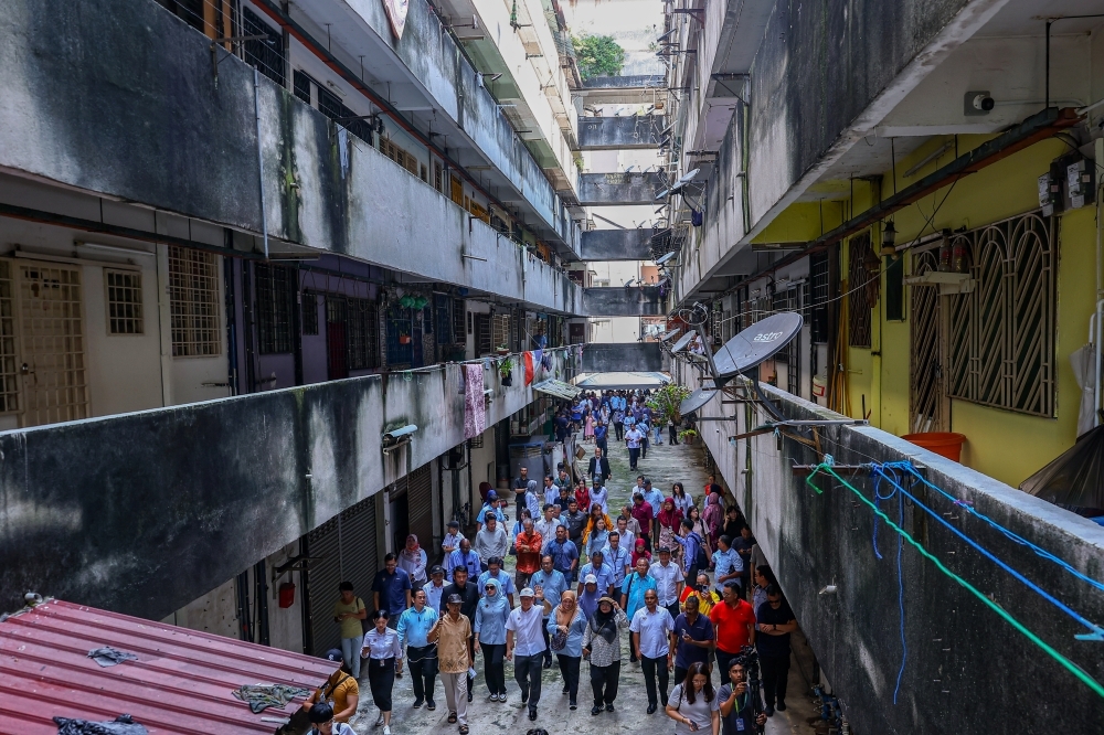 Accused of driving Malays from cities under guise of urban renewal, Nga Kor Ming says it's about rescuing the poor