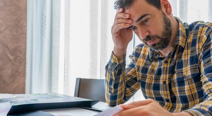 Should I sell my vacation home that I dream of living in when I retire to pay off $50K in credit card debt?