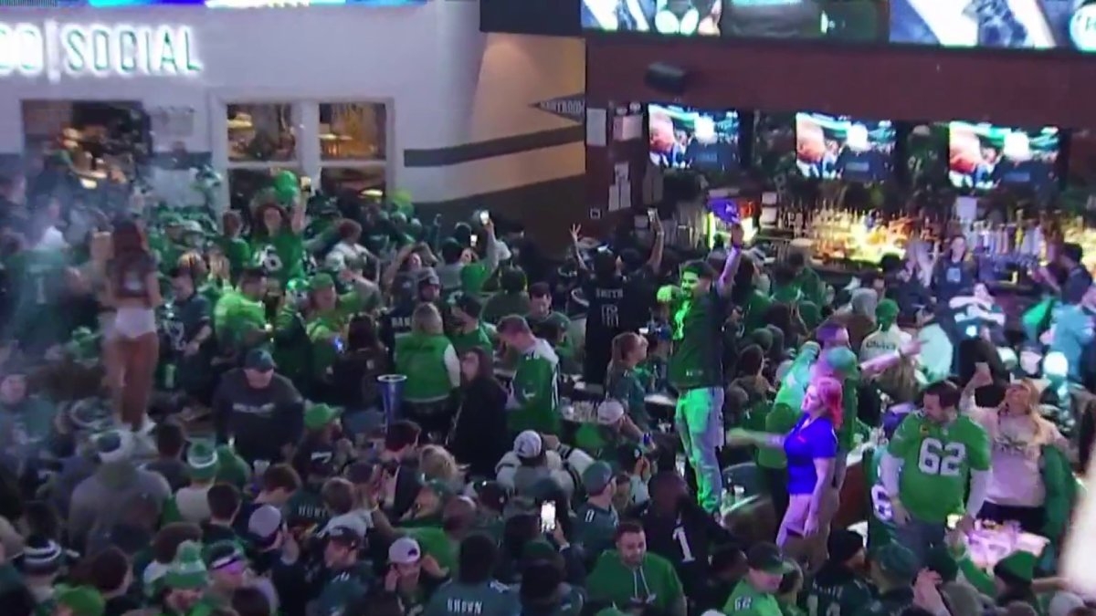 Eagles fans at XFinity Live! celebrate the Birds' dominant Super Bowl win