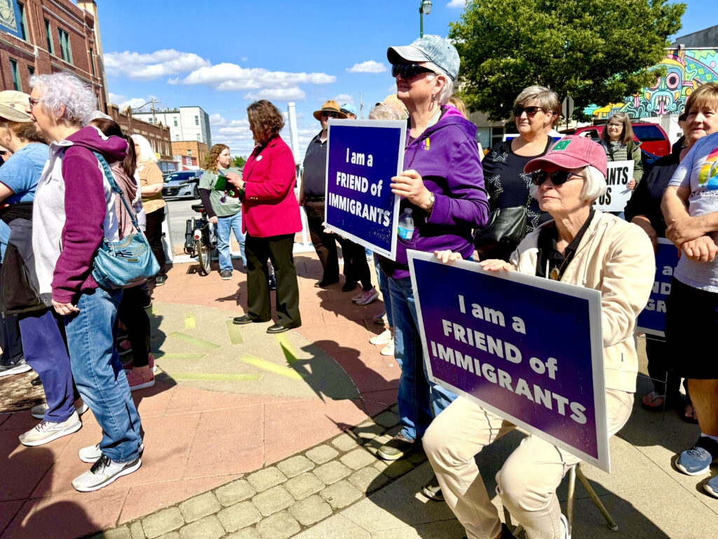 Show of support for immigrants and refugees gets loud on Omaha's South 24th Street