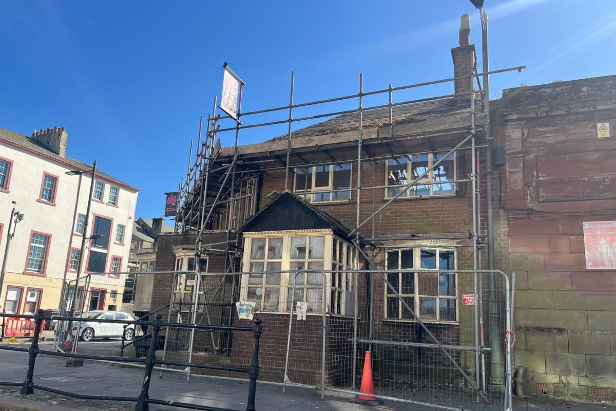 Demolition under way at derelict former pub