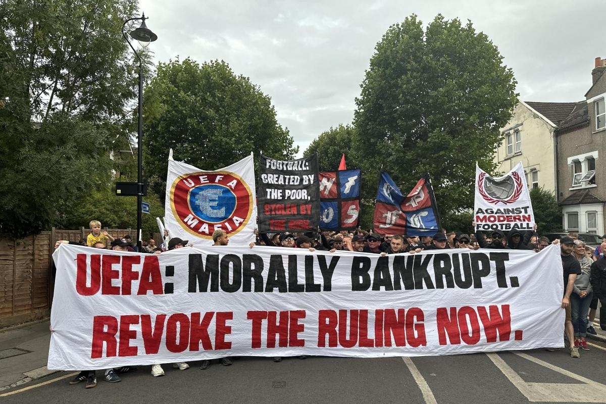 Crystal Palace supporters hit out at UEFA in protest against Europa League demotion