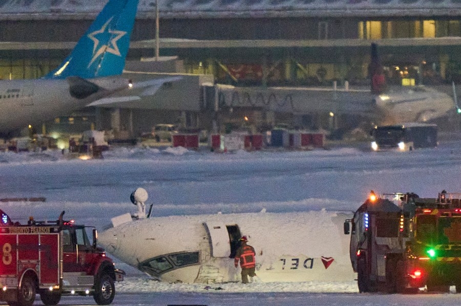 ‘Upside down and burning': All passengers escape Delta plane crash